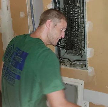 Electrician working on a residential electrical panel