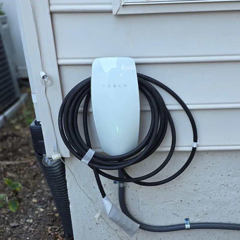Weather-rated EV charger installed outside a Northern Virginia home