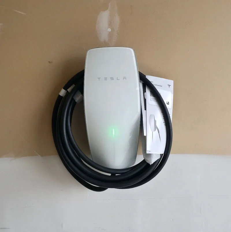 Tesla Wall Connector professionally mounted on a garage wall